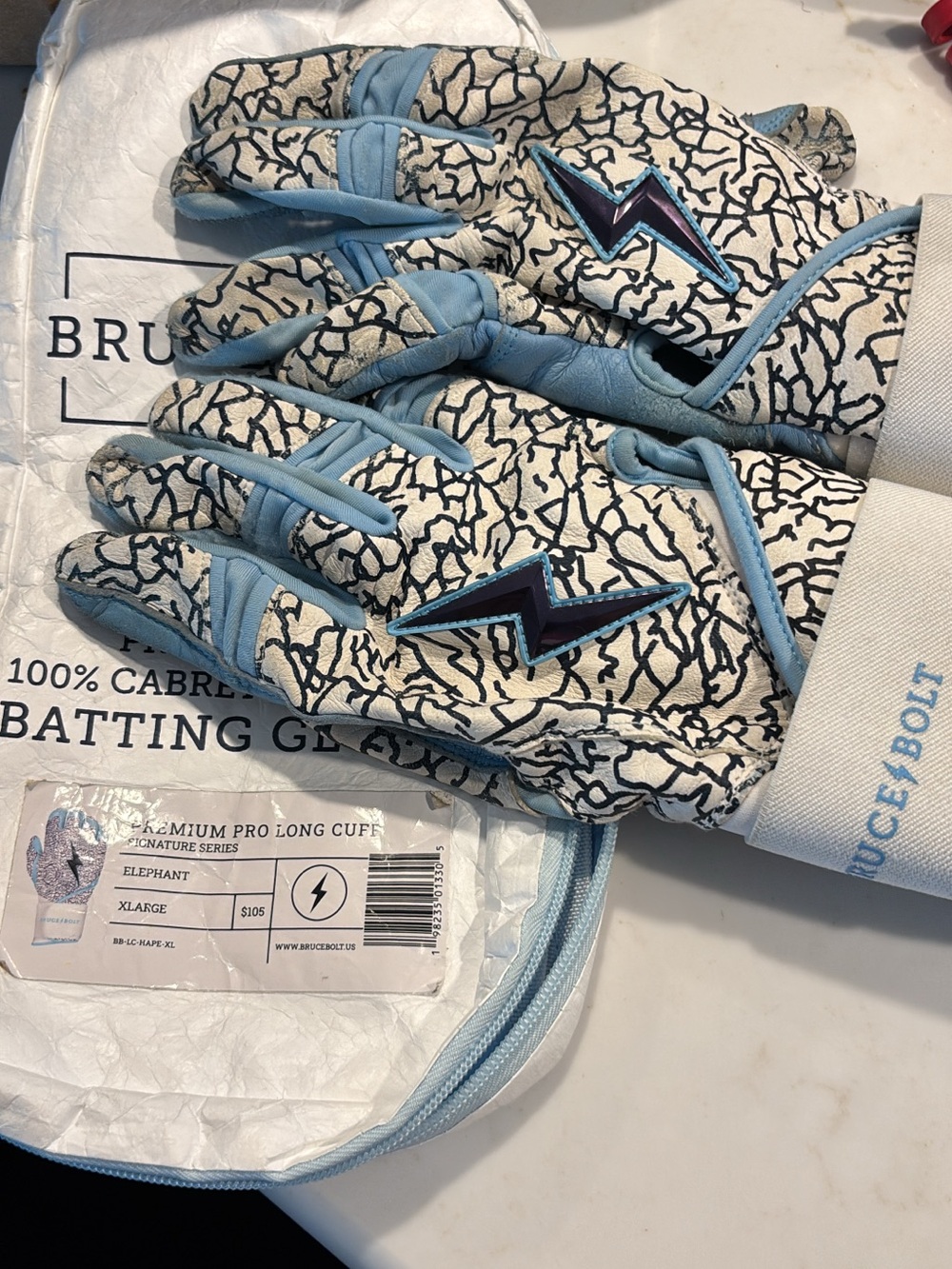 Bruce Bolt Lightning Logo Batting Gloves in White and Light Blue
